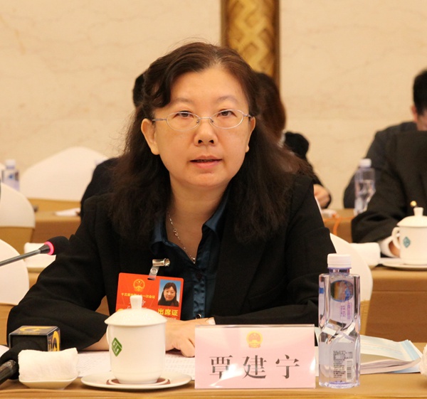 覃建宁履职照.jpg