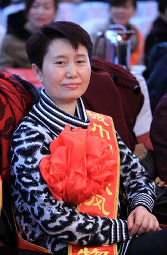 农工党员陈丽萍获得港城巾帼十大风云人物和三八红旗手标兵称号